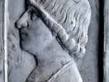 an image of a sculpture of a woman with a headband