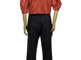 the back of a mannequin wearing a red shirt and black pants