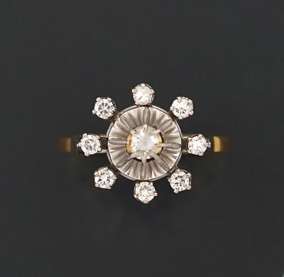 Bague en deux tons d'or jaune et gris 18K 750 millièmes orné…