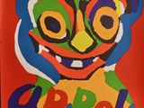 a colorful poster with an image of a clown on it