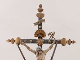 a statue of jesus on a cross with a cross on it