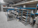 a room with a lot of shelves and a lot of items