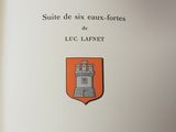 an open book with a picture of a castle on it