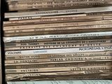 a box full of old records sitting on a table