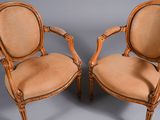 pair of louis xvi style carved wood armchairs