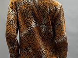 the back view of a leopard print blouse on a mannequin mannequin mannequin mannequin mannequin mannequin mannequin mann