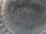 a close up view of a glass with a logo on it