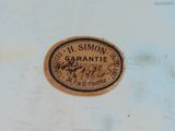 a close up of a label on a white plate
