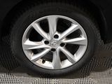 a close up of a tire on a car ' s rim
