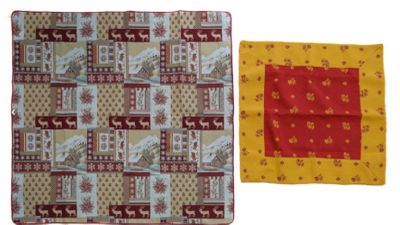 two pieces of cloth that are on a table