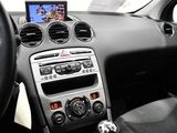 a car dashboard with a digital device in the center of it