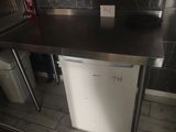 an image of a kitchen with a refrigerator and a sink