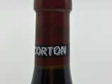 a bottle of wine that is sitting on a table