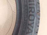an image of a close up of a tire on a cardboard box