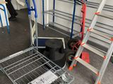 a dolly cart and a hand truck in a room