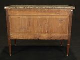 an old wooden cabinet with a marble top on a black background