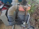a machine that is sitting on the side of the road