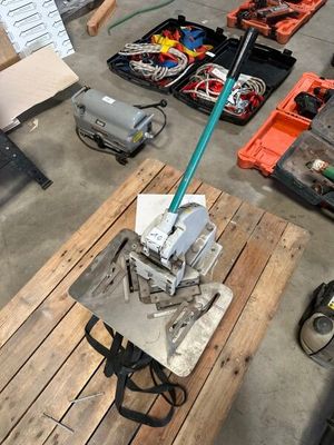a small machine that is sitting on top of a pallet