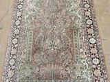 an oriental rug on the floor in a living room