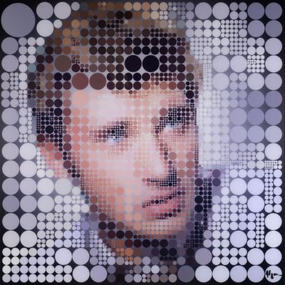 une photo du visage d'un homme composé de cercles
