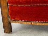 an image of a close up of a chair with a red velvet upholstered seat