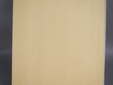an empty piece of paper on a gray surface