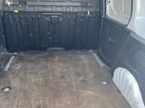 the back of a van with the door open and the cargo compartment in the back