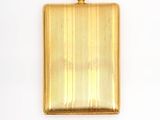an image of a gold locke with a clasp on it