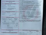 a picture of a car ' s driver ' s license and identification card