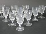 a lot of empty wine glasses on the table