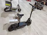 a scooter that is sitting on the floor in a store