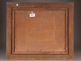 an old wooden picture frame with a tag on it