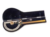 a guitar case with a key in it on a white background