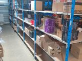 many boxes and boxes on the shelves in the warehouse