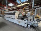 l'image d'une machine située à l'intérieur d'un bâtiment