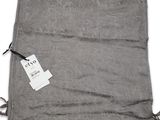 a close up of a towel with a tag on it
