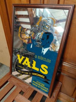 a picture of a poster on the wall of a room
