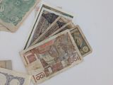 many different types of currency on the table
