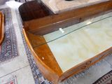 a table with a glass top in a room