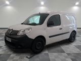 a picture of a white van parked on a checkered floor