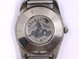 an image of a wrist watch with a dragon on the face