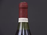a bottle of wine that is sitting on a table