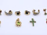 a set of seven pairs of gold and enamel jewelry