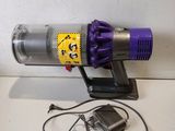 an image of a vacuum cleaner with a cord attached to it