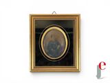 a picture of a picture of a woman hanging on a wall