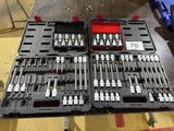 many tools in the trays on the table