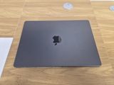 an apple macbook pro laptop sitting on top of a wooden table