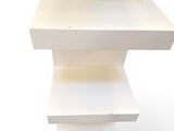 a stack of white shelves on a white background
