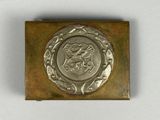 an image of a metal plaque with a lion on it
