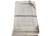 a stack of old books sitting on top of each other